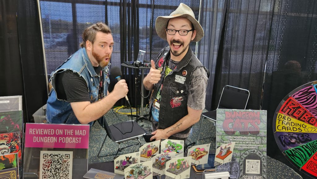 SQ 208 Gamehole Con 2023 & Cabin in the Woods Con 2023 Recaps. Dragon Warrior (Steve Albertson) and Tiger Wizard (Andrew Bellury) podcasting live from Gamehole Con in Madison, WI.